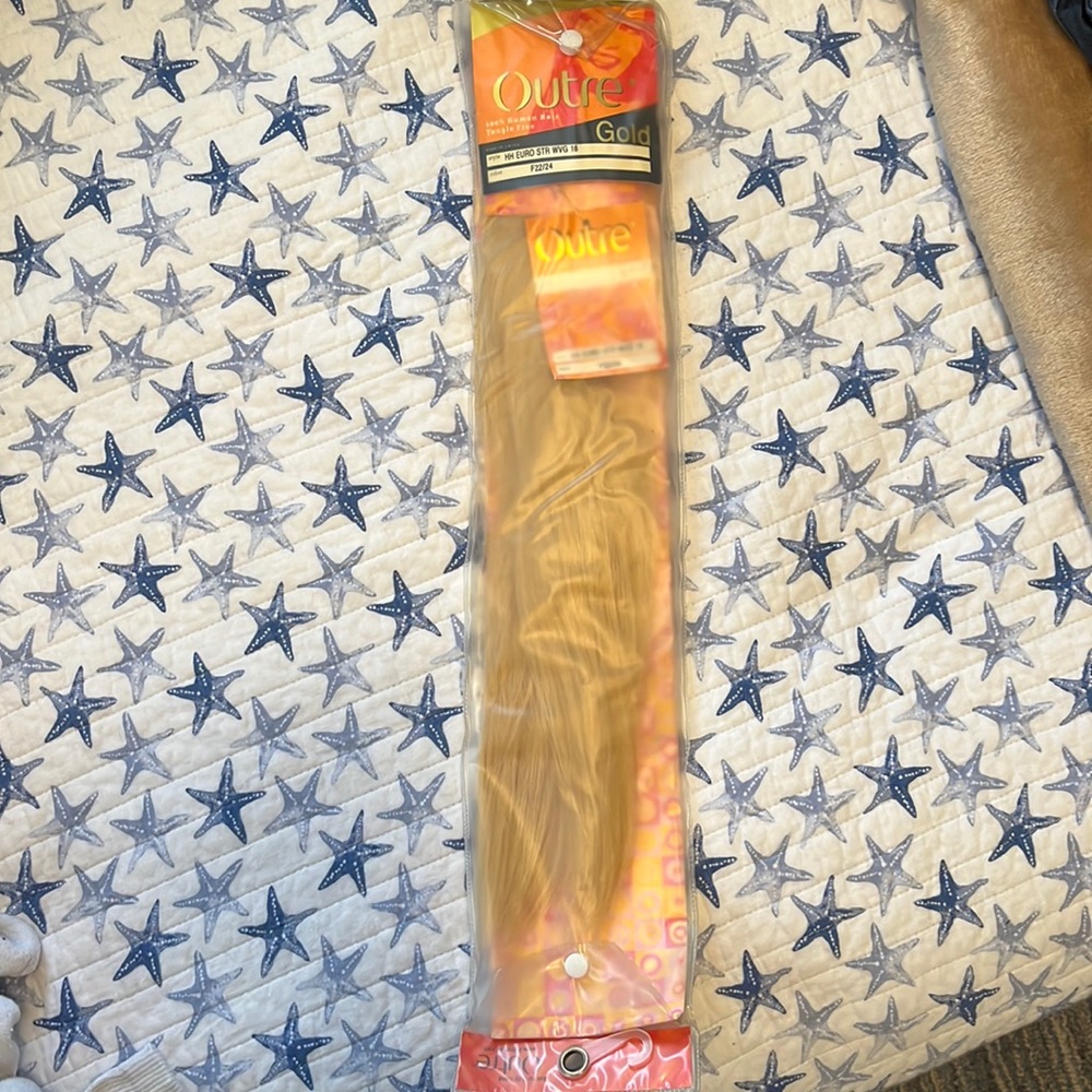 Extensions- human hair/ gold blonde